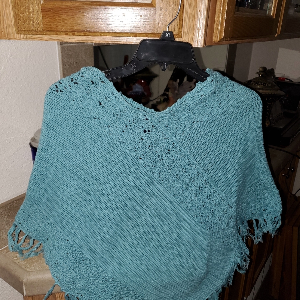 Turquiose Poncho youth xlg 14/16